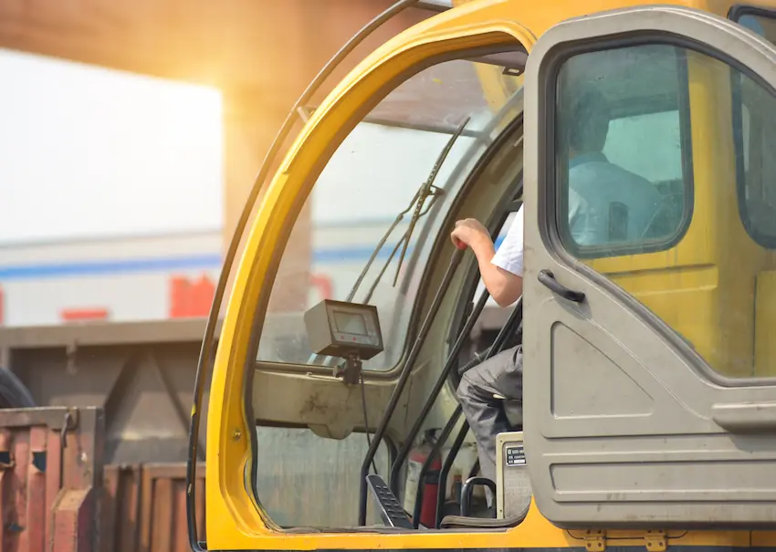 Man operating crane